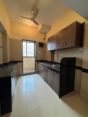 Kitchen in 2 BHK Apartment at K Raheja Heights, Malad East – for Rent