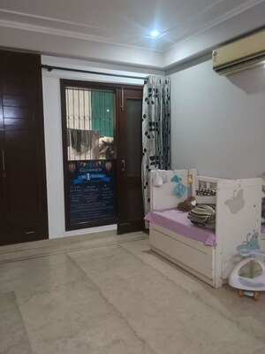 Bedroom in 4 BHK Builder Floor at Kailash Colony – for Sale