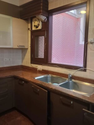 Kitchen in 4 BHK Builder Floor at Kailash Colony – for Sale