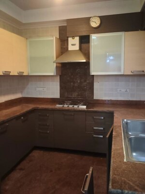 Kitchen in 4 BHK Builder Floor at Kailash Colony – for Sale