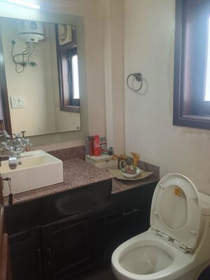 Bathroom in 4 BHK Builder Floor at Kailash Colony – for Sale