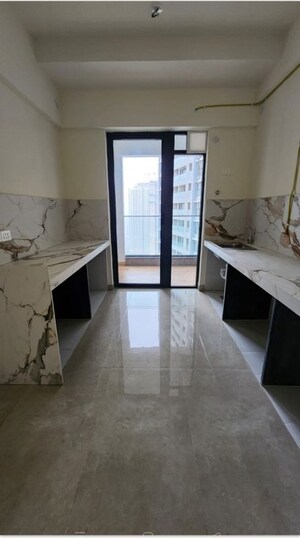 Kitchen in 4 BHK Apartment at Raymond The Address, Pokhran Road No Two – for Sale