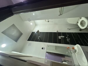 Bathroom in 3 BHK Builder Floor at Dwarka Mor – for Rent