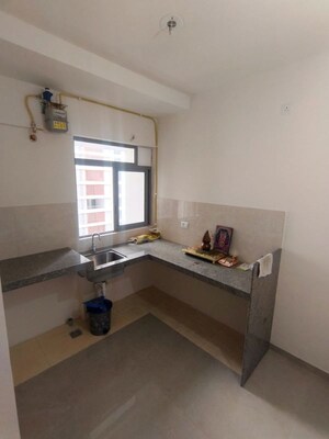 Kitchen in 1 BHK Apartment at Piramal Vaikunth, Balkum Pada – for Rent