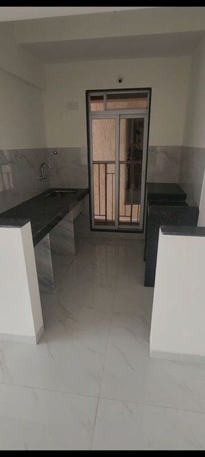 Kitchen in 1 BHK Apartment at Metropolis Bayside, Kasarvadavali – for Rent