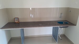 Kitchen in 2 BHK Apartment at Puranik City Reserva, Ghodbunder Road – for Rent