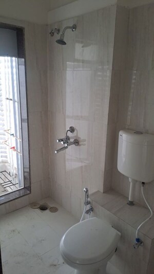 Bathroom in 2 BHK Apartment at Puranik City Reserva, Ghodbunder Road – for Rent