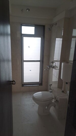 Bathroom in 2 BHK Apartment at Puranik City Reserva, Ghodbunder Road – for Rent