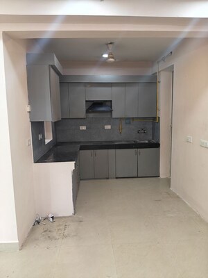 Kitchen in 2 BHK Apartment at Sikka Karmic Greens, Sector 78 – for Rent