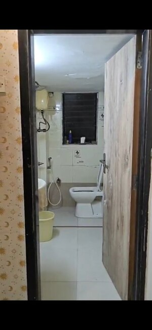 Bathroom in 2 BHK Apartment at OM Elegance, Malad West – for Sale