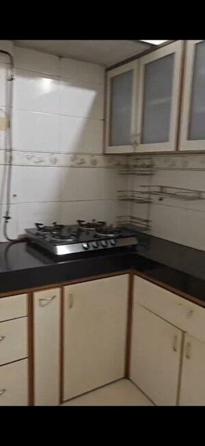 Kitchen in 2 BHK Apartment at OM Elegance, Malad West – for Sale
