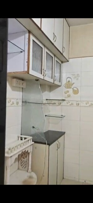 Kitchen in 2 BHK Apartment at OM Elegance, Malad West – for Sale
