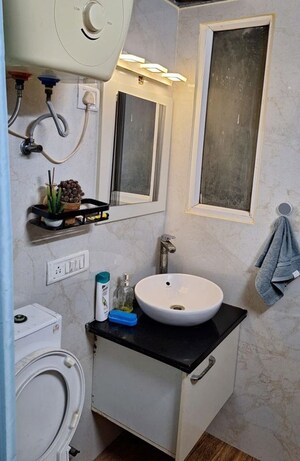Bathroom in 2.5 BHK Apartment at Sikka Karmic Greens, Sector 78 – for Rent