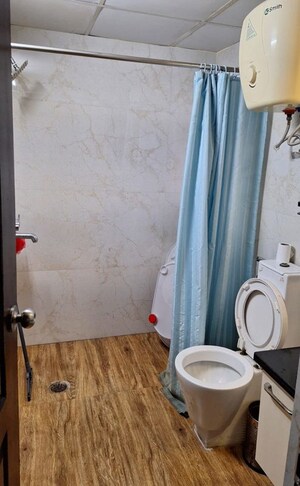 Bathroom in 2.5 BHK Apartment at Sikka Karmic Greens, Sector 78 – for Rent
