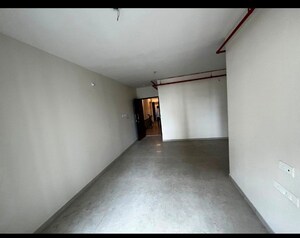 Living Room in 2 BHK Apartment at Dosti West County, Balkum Pada – for Sale