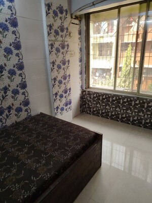 Bedroom in 2 BHK Apartment at Shree Gurukrupa Ashish CHS, New Panvel Sector 17 – for Rent