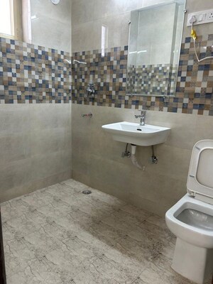 Bathroom in 4 BHK Builder Floor at Sector 17 Dwarka – for Rent