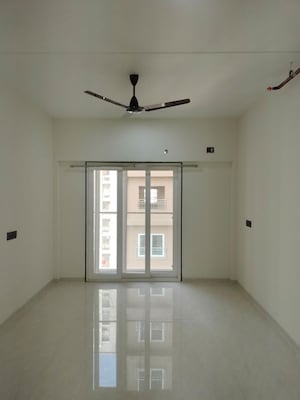 Room in 2 BHK Apartment at Omkar Ananta, Goregaon East – for Rent