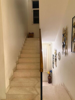 Staircase in 3 BHK Villa at Prestige Augusta Golf Village, Kothanur – for Sale