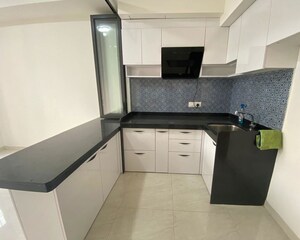 Kitchen in 1 BHK Apartment at Lodha Crown Quality Homes, Majiwada – for Rent
