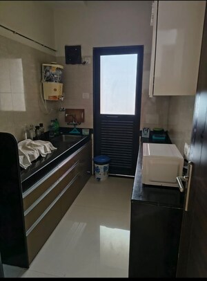 Kitchen in 1 BHK Apartment at K Raheja Heights, Malad East – for Rent