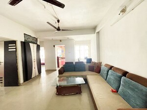 Living Room in 2 BHK Apartment at Maninagar – for Sale