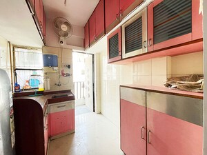 Kitchen in 2 BHK Apartment at Maninagar – for Sale