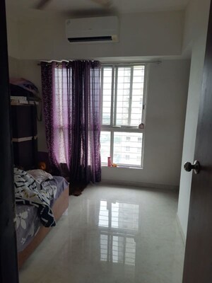 Living Room in 2 BHK Apartment at Lodha Amara, Kolshet Road – for Rent