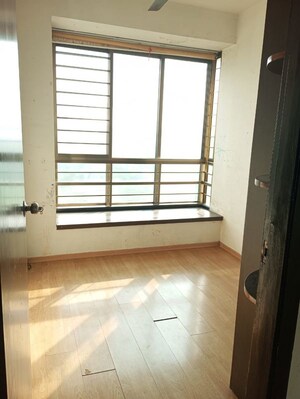 Room in 2.5 BHK Apartment at Oberoi Realty Woods, Goregaon East – for Rent