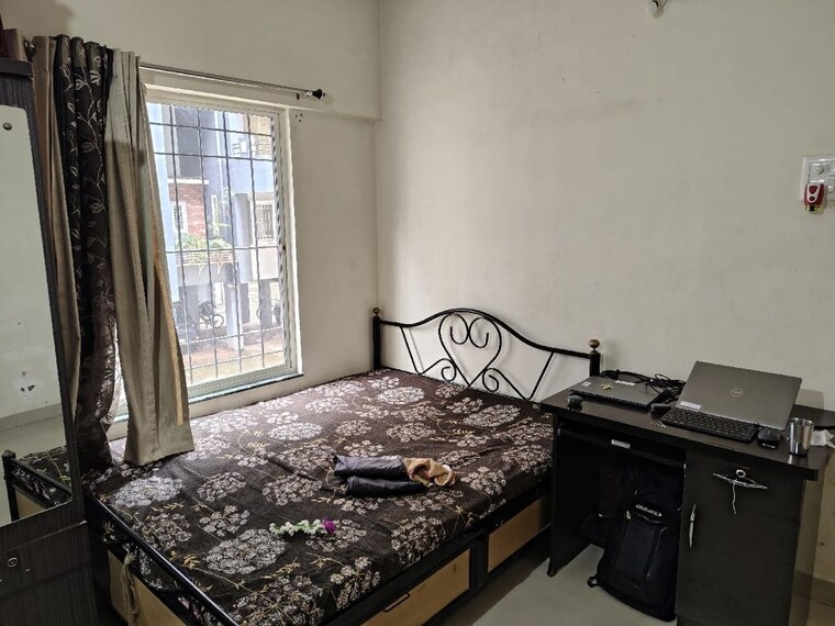 Bedroom, aishwaryam-greens-co-operative-housing-society 1 Bedroom 417 Sq.Ft. Apartment In Wakad Pune 10619119