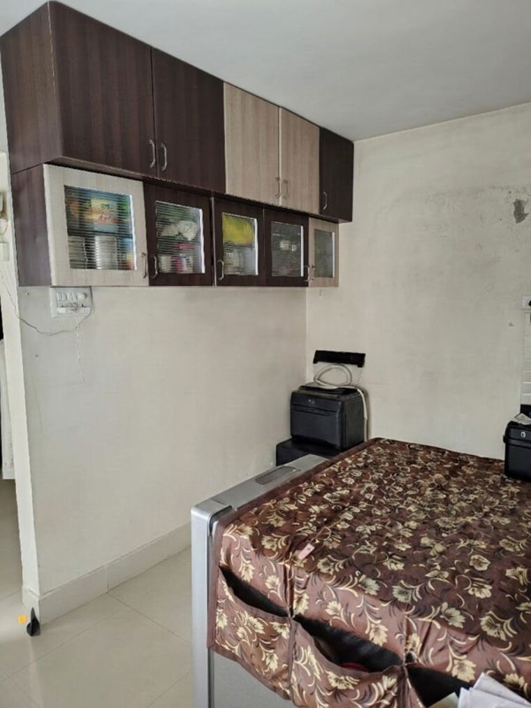 Bedroom, aishwaryam-greens-co-operative-housing-society 1 Bedroom 417 Sq.Ft. Apartment In Wakad Pune 10619119