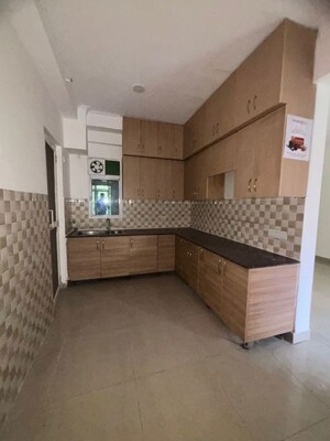 Kitchen in 3 BHK Apartment at Prateek Wisteria, Sector 77 – for Sale