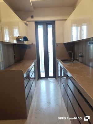 Kitchen in 2 BHK Apartment at Rustomjee Paramount, Khar West – for Rent