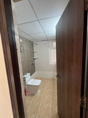 Bathroom in 2 BHK Apartment at AFOWO Raksha Addela, Sector 16c Greater Noida – for Sale