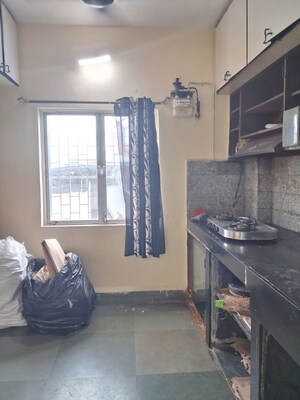 Living Room in 1 BHK Apartment at Lokpuram CHS, Vasant Vihar – for Rent