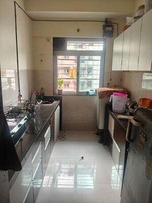 Kitchen in 1 BHK Apartment at Sheth Midori, Dahisar East – for Sale