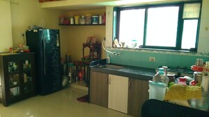 Kitchen in 2 BHK Apartment at Rahul Atul Nagar CHS, Warje – for Rent