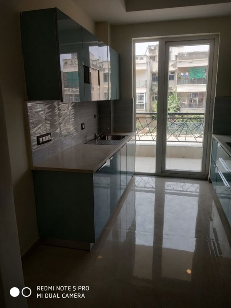 Kitchen, versalia-woodwinds 4 Bedroom 300 Sq.Yd. Builder Floor In Sector 67 Gurgaon 10619433