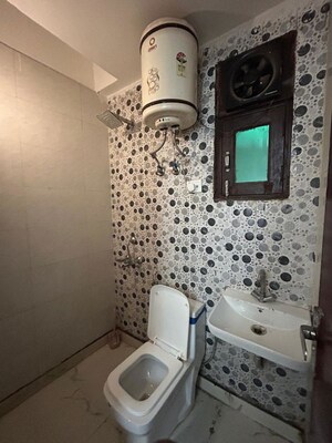 Bathroom in 1 BHK Builder Floor at Freedom Fighters Enclave – for Rent