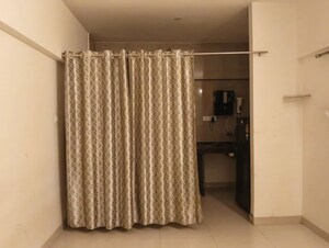 Living Room in 1 BHK Apartment at Gera Shrishti, Wagholi – for Rent