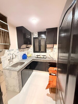 Kitchen in 3 BHK Builder Floor at Freedom Fighters Enclave – for Rent