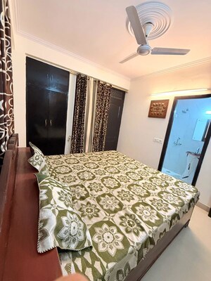 Bedroom in 3 BHK Builder Floor at Freedom Fighters Enclave – for Rent