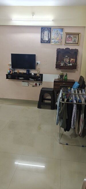 Living Room in 1 BHK Apartment at Tanvi Eminence, Mira Road – for Sale
