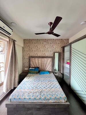Bedroom in 2 BHK Apartment at Paradise Lifespaces Sai World City, New Panvel – for Rent