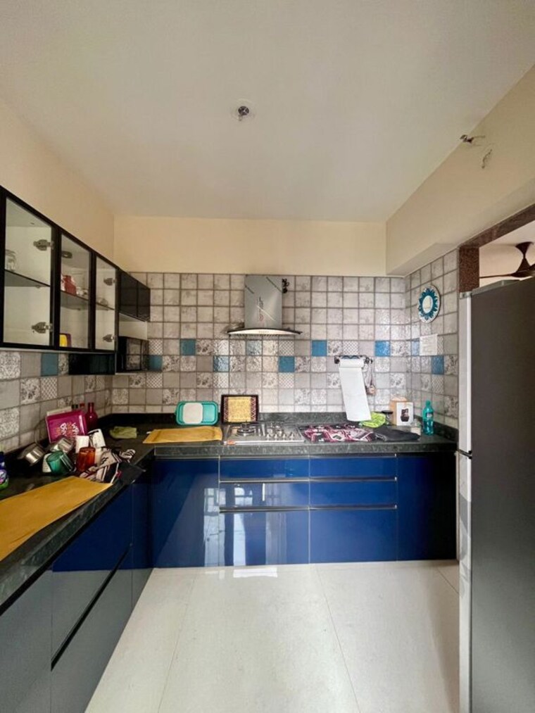 Kitchen, paradise-lifespaces-sai-world-city 2 Bedroom 1000 Sq.Ft. Apartment In New Panvel Navi Mumbai 10619503