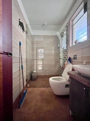 Bathroom in 2 BHK Apartment at Paradise Lifespaces Sai World City, New Panvel – for Rent