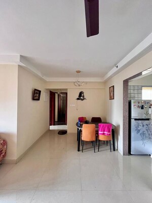 Living Room in 2 BHK Apartment at Paradise Lifespaces Sai World City, New Panvel – for Rent