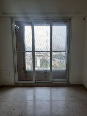 Bedroom in 2 BHK Apartment at Dosti Flamingos, Parel – for Rent