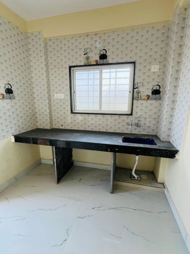 Kitchen, wadgaon sheri 1 Bedroom 600 Sq.Ft. Apartment In Wadgaon Sheri Pune 10619582