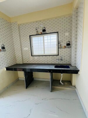 Kitchen in 1 BHK Apartment at Wadgaon Sheri – for Rent